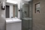 Arapaho property bathroom with glass shower and sleek vanity